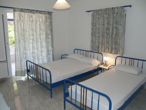 Karavagelis Rooms Rovies Extérieur photo